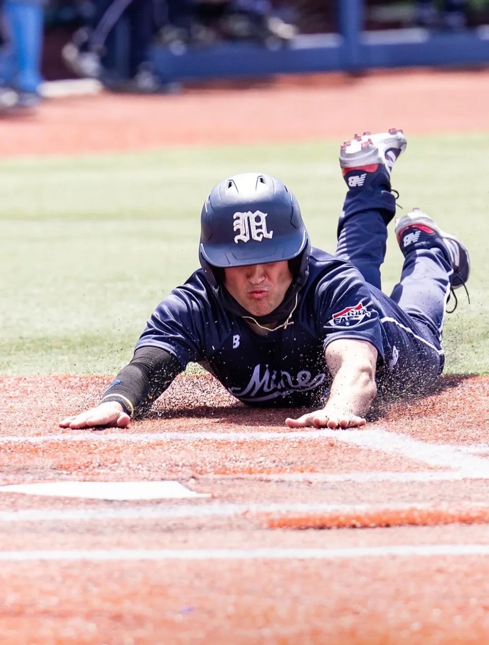 Nic Pepe head-first slide into home plate