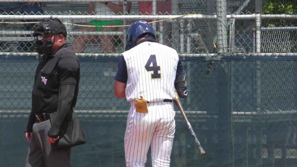 Nic Pepe walking to the plate